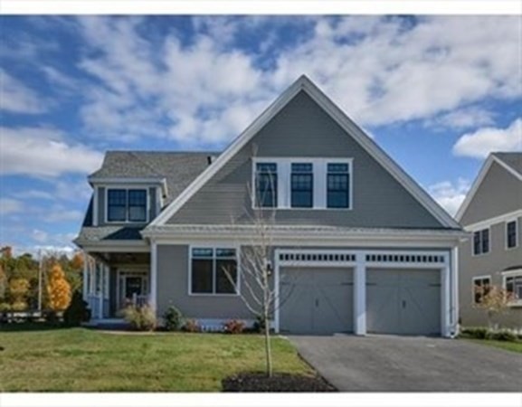 3 Mill Stone Drive, Unit 3 Sherborn, MA 01770 - Photo 18 of 23 a front view of house with a yard