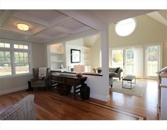 3 Mill Stone Drive, Unit 3 Sherborn, MA 01770 - Photo 7 of 23 a living room with furniture and a large window