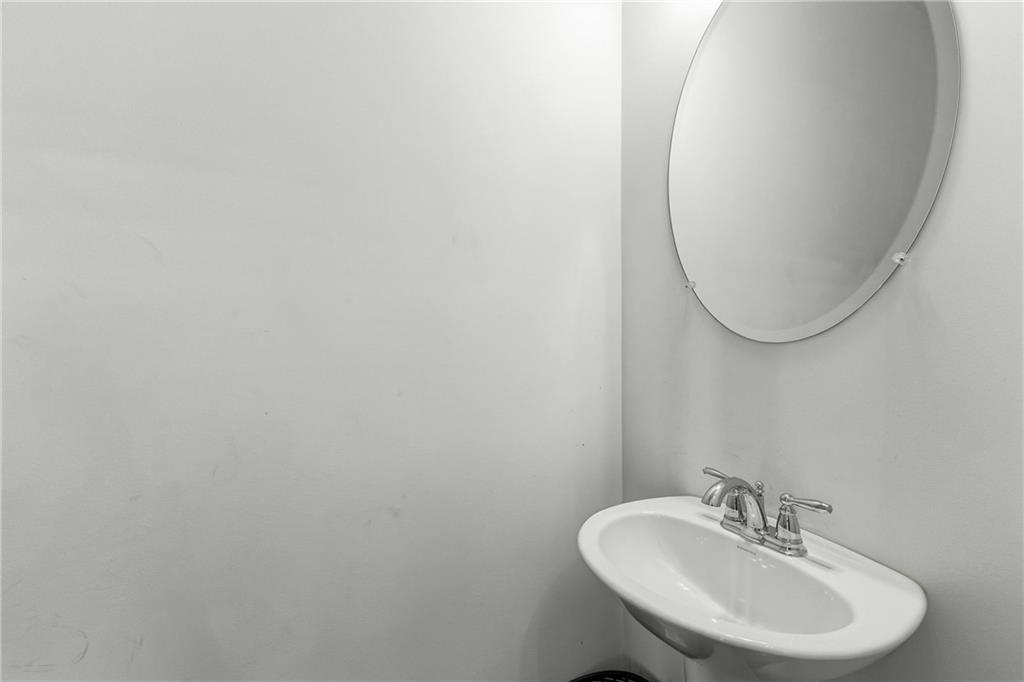 2275 Rolling Trail Lithonia, GA 30058 - Photo 12 of 38 a bathroom with a sink and a mirror