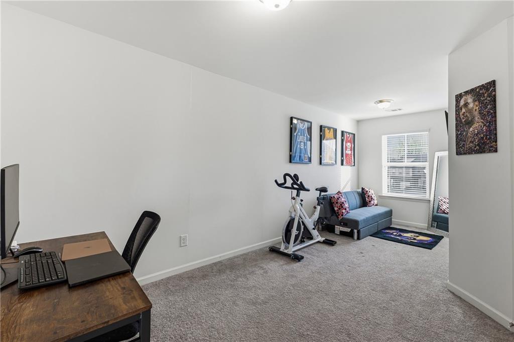 2275 Rolling Trail Lithonia, GA 30058 - Photo 20 of 38 a room with furniture and a window