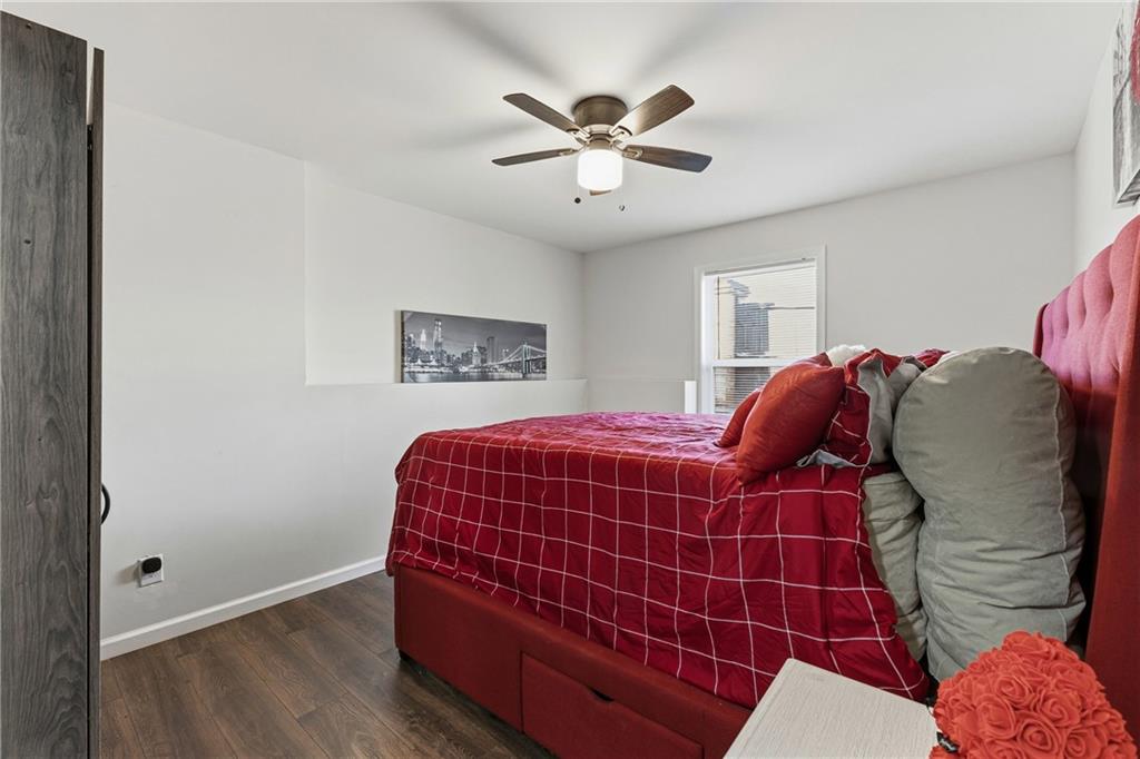 2275 Rolling Trail Lithonia, GA 30058 - Photo 34 of 38 a bedroom with a bed and a fan