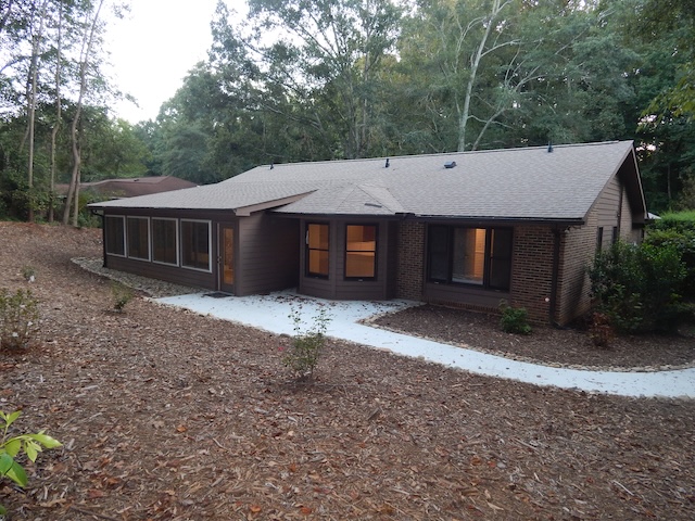 620 Downs Loop Clemson, SC 29631 - Photo 33 of 35 A quiet wooded setting highlights the classic brick and siding exterior of this ranch home.
