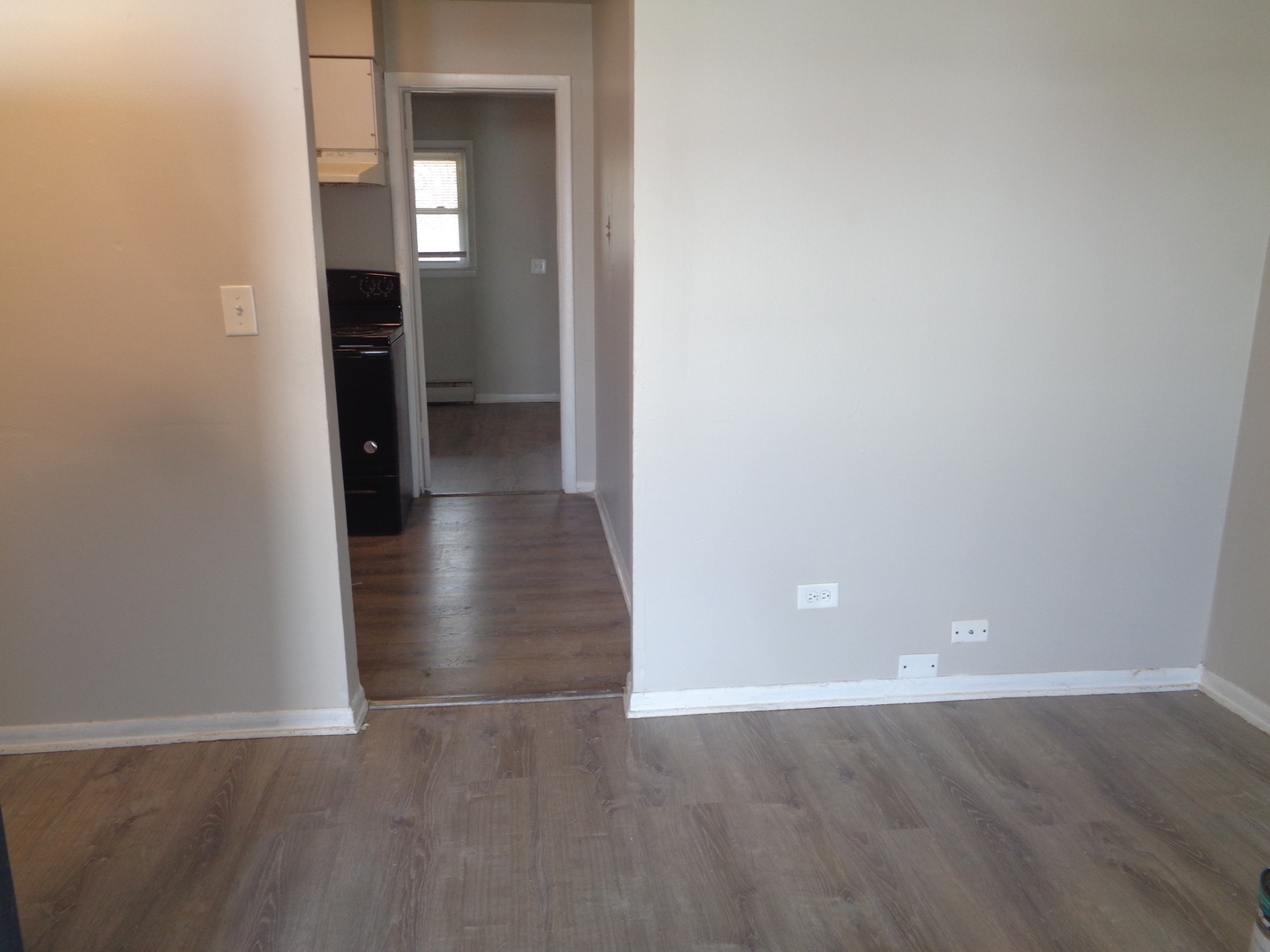 1340 North Main Street, Unit A13 Wheaton, IL 60187 - Photo 4 of 6 a view of a hallway with wooden shelves