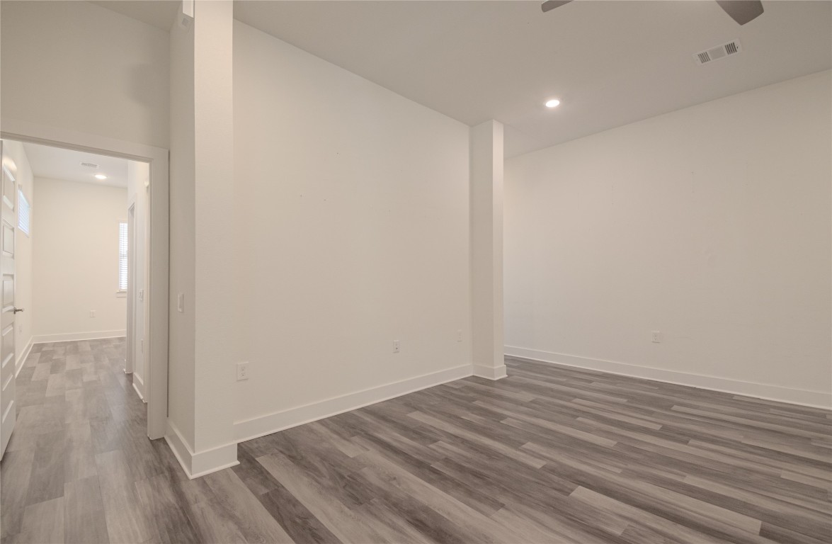 6325 Ponca Street, Unit A Austin, TX 78741 - Photo 13 of 21 a view of room with wooden floor