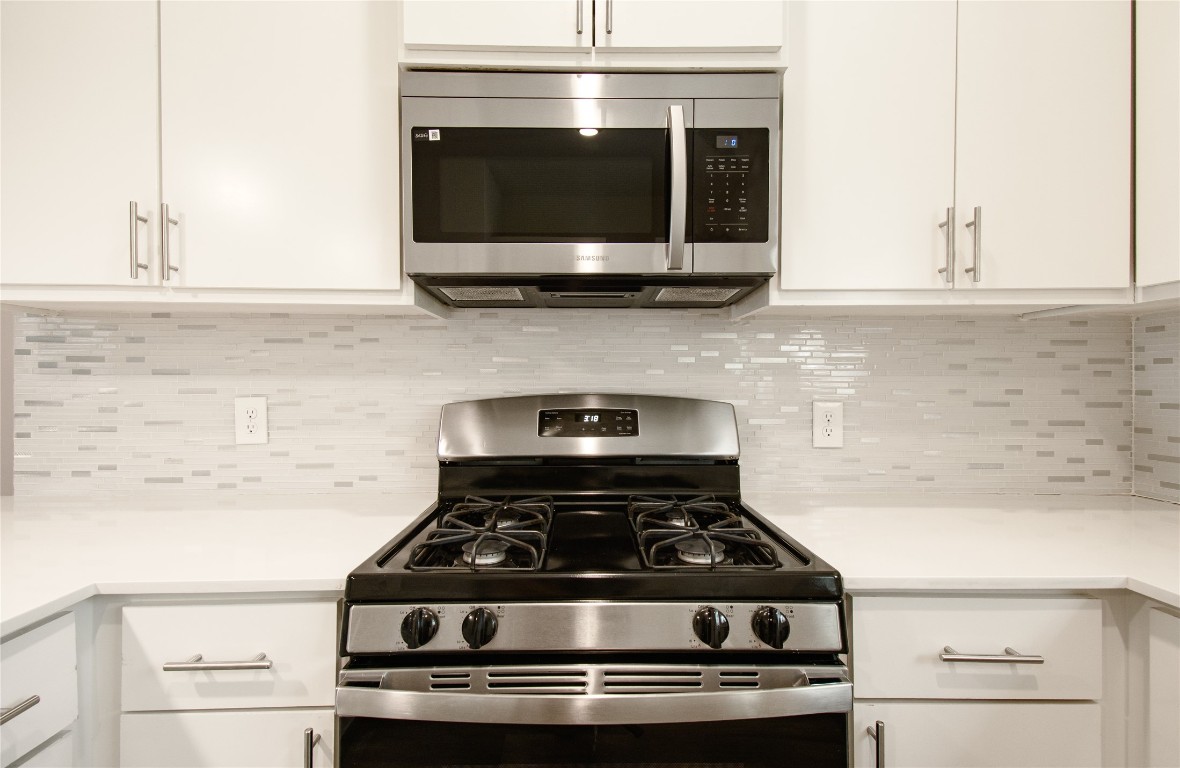 6325 Ponca Street, Unit A Austin, TX 78741 - Photo 20 of 21 a stove top oven sitting inside of a kitchen
