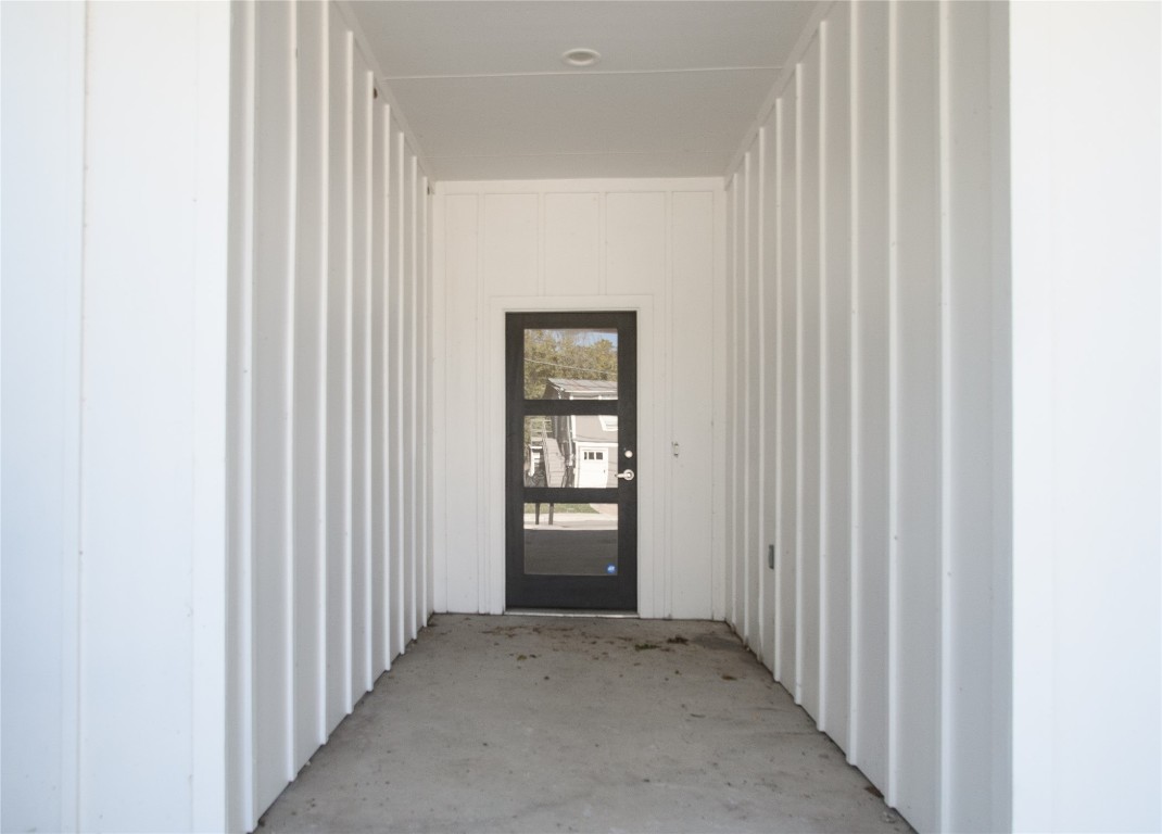 6325 Ponca Street, Unit A Austin, TX 78741 - Photo 2 of 21 a view of a hallway with windows