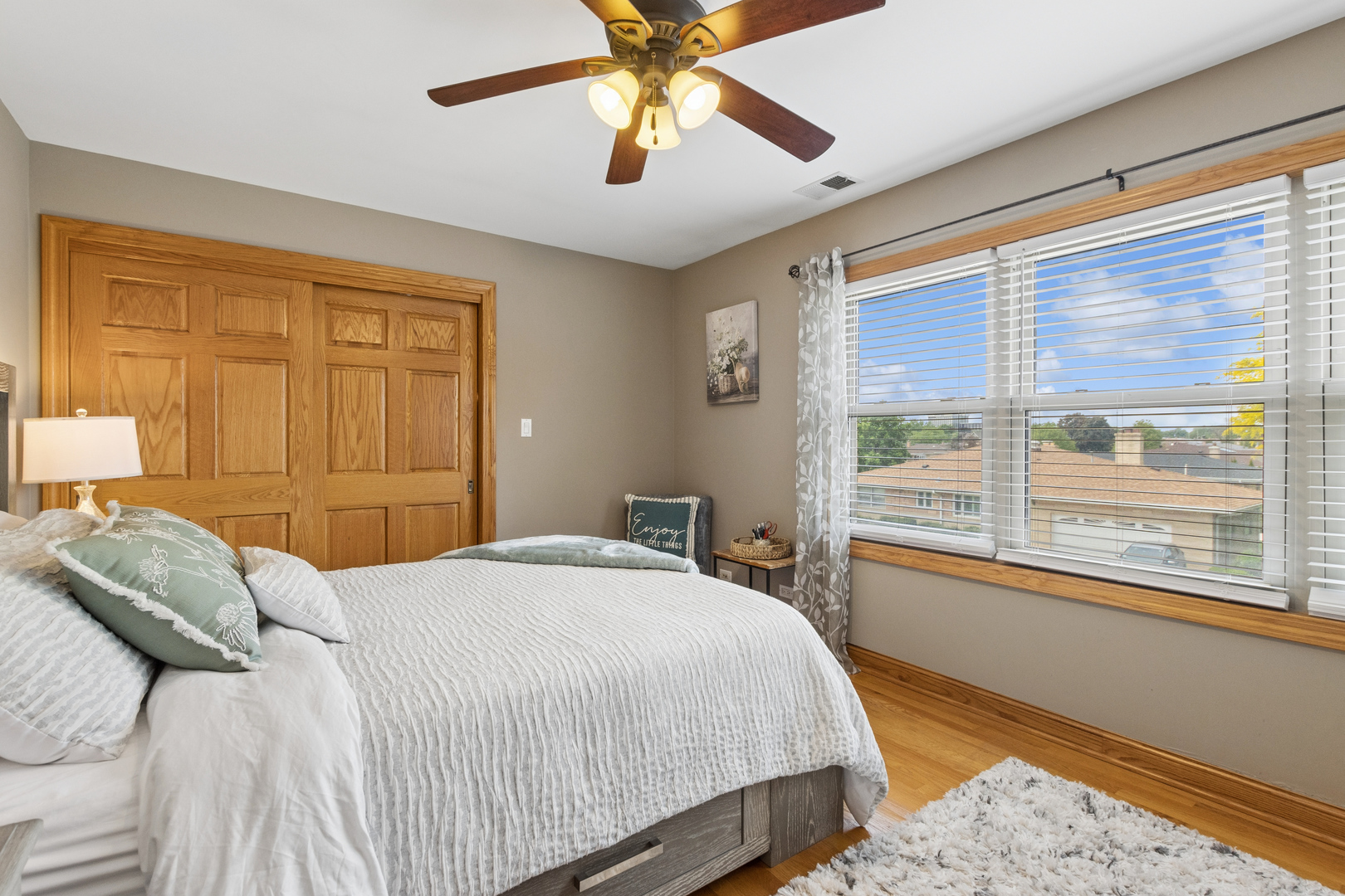 7911 West Rascher Avenue Chicago, IL 60656 - Photo 29 of 39 a bedroom with a large bed and a window