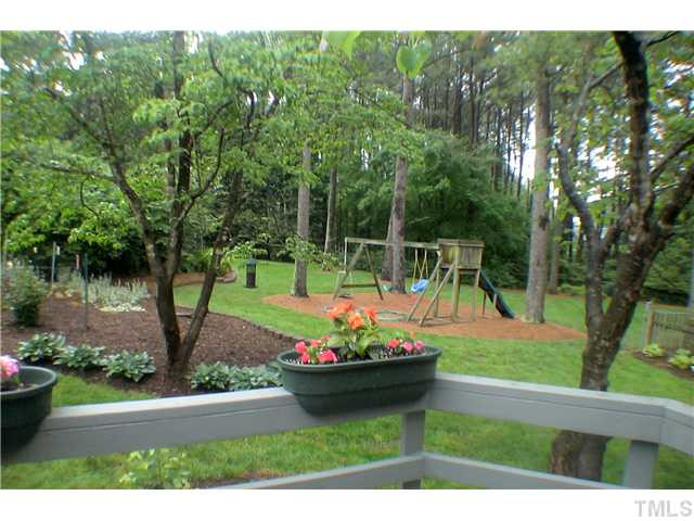 404 Chowning Place Raleigh, NC 27614 - Photo 21 of 25 A breathtaking view of the back yard from the covered desk