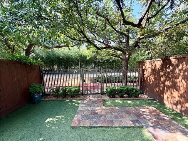 a view of a backyard with a garden