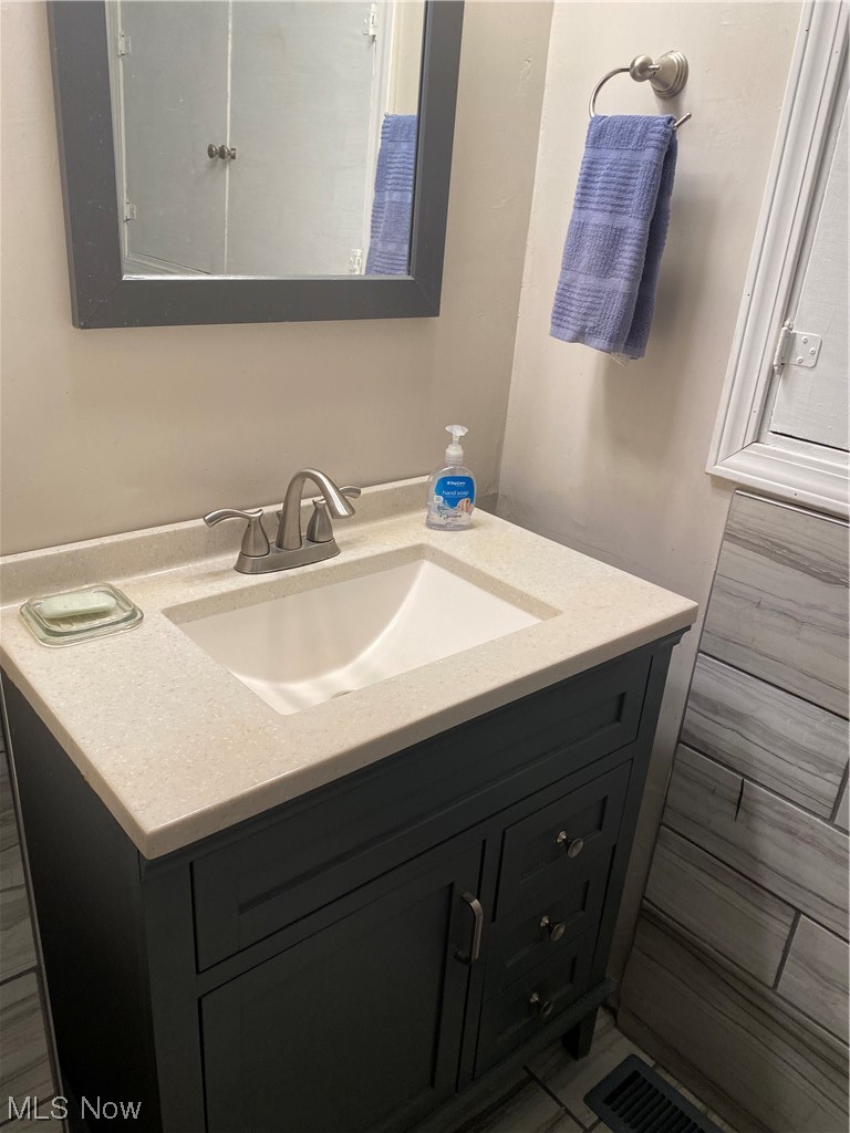 19801 Upper Terrace Road Euclid, OH 44117 - Photo 13 of 22 Bathroom featuring large vanity