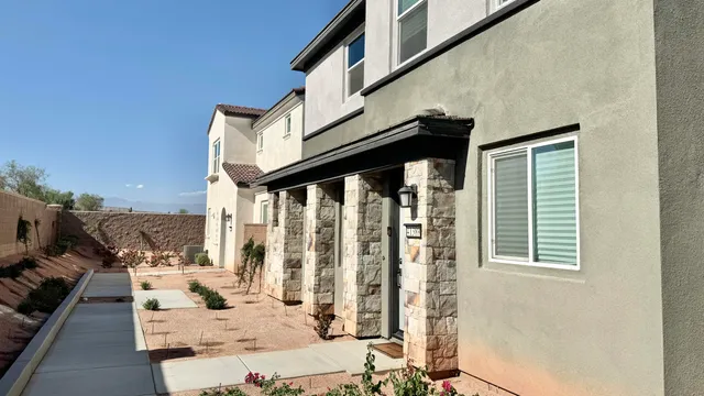a kitchen with a sink appliances and cabinets