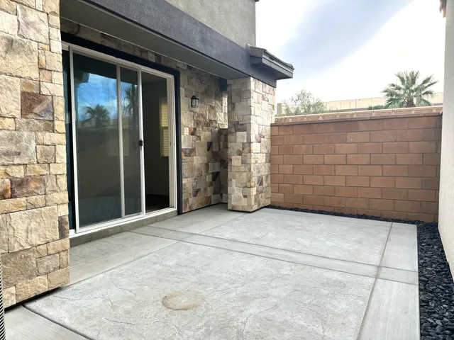 a view of a entryway door with an outdoor space