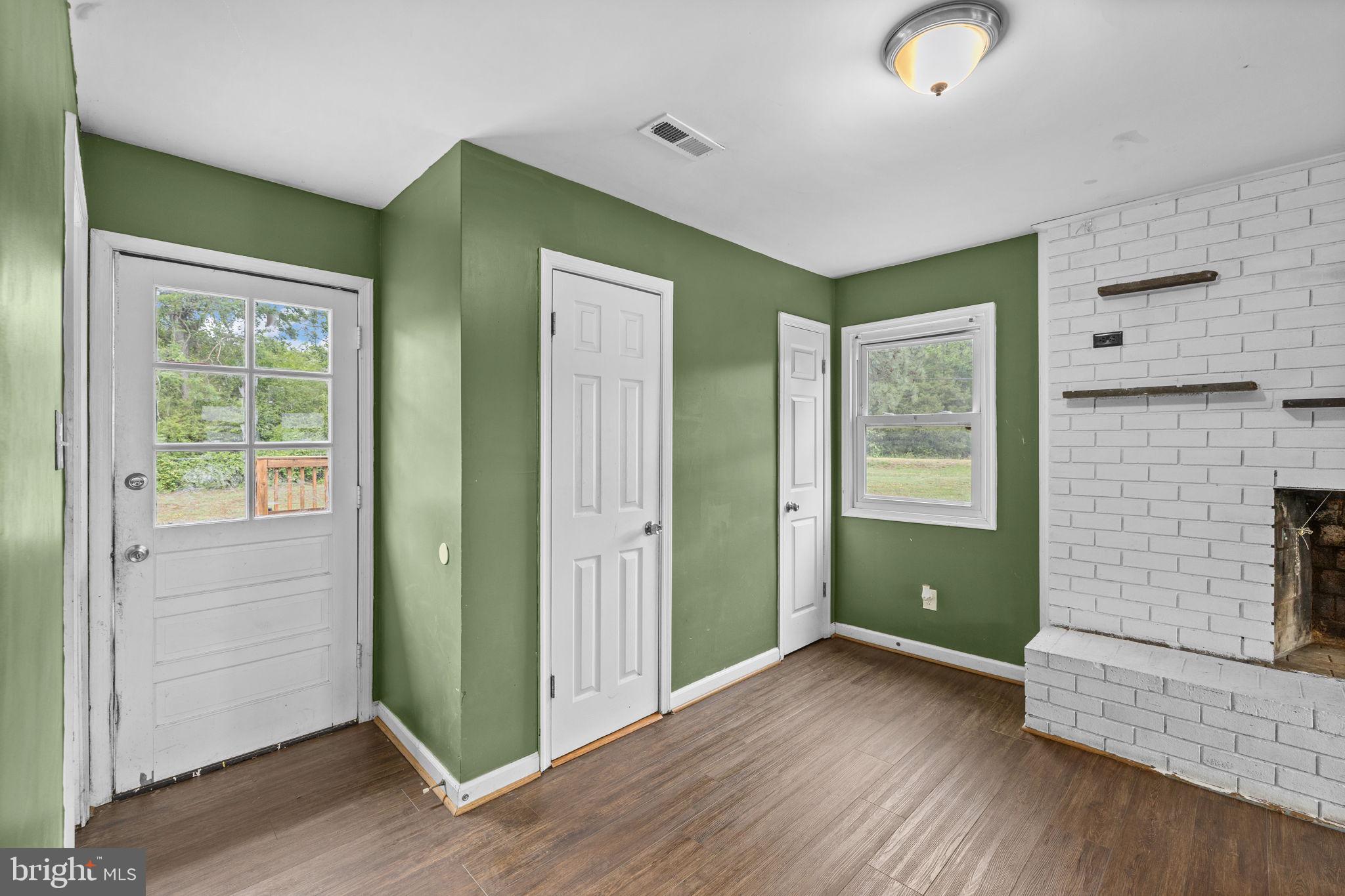 13245 Glen Level Drive Ruther Glen, VA 22546 - Photo 17 of 37 a view of room with window and wooden floor