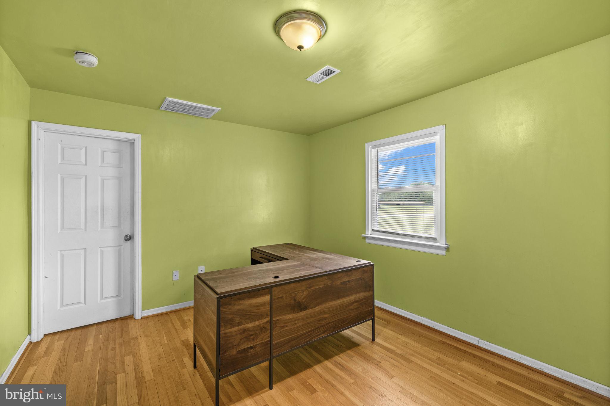 13245 Glen Level Drive Ruther Glen, VA 22546 - Photo 20 of 37 a room with a bed and a window