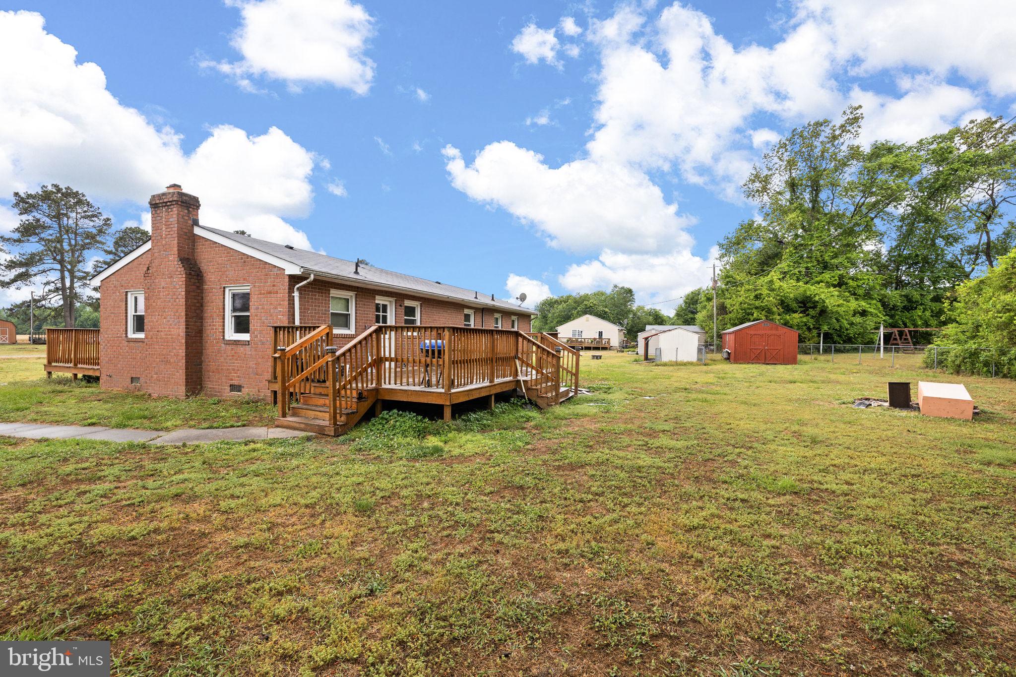 13245 Glen Level Drive Ruther Glen, VA 22546 - Photo 3 of 37 a view of a house with backyard