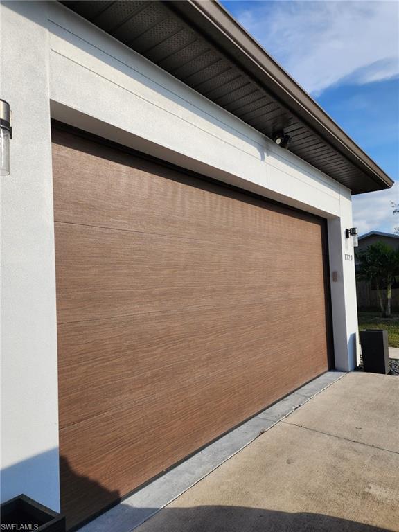 1720 46th Terrace Southwest Naples, FL 34116 - Photo 4 of 24 View of garage