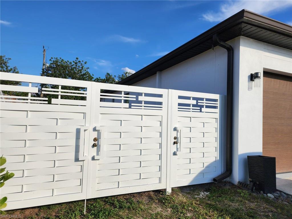 1720 46th Terrace Southwest Naples, FL 34116 - Photo 6 of 24 View of gate