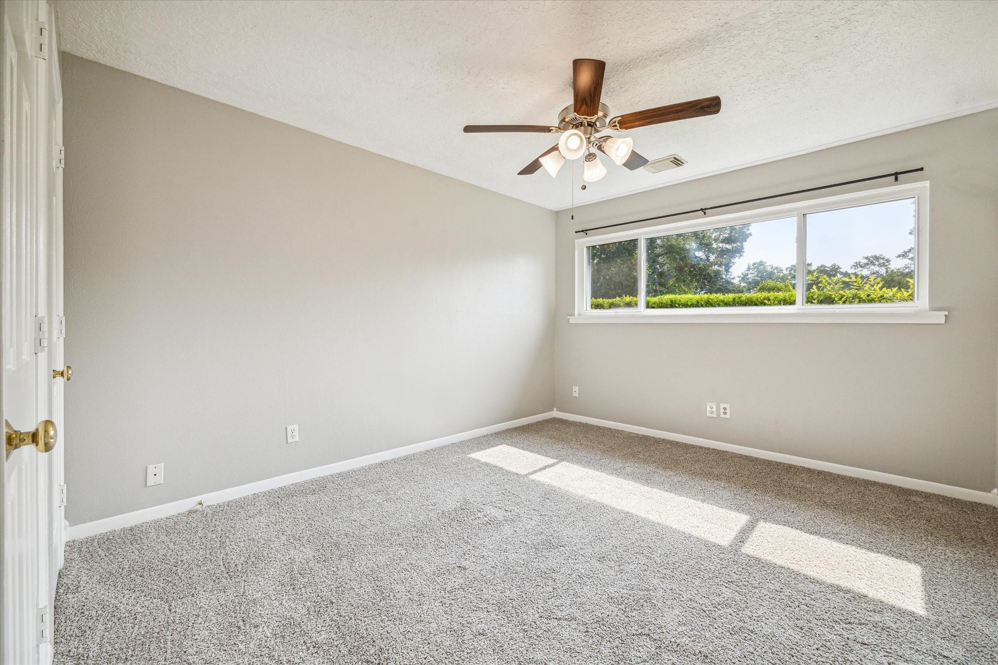 3613 Lazy Spring Drive Houston, TX 77080 - Photo 14 of 22 a view of an empty room with a window