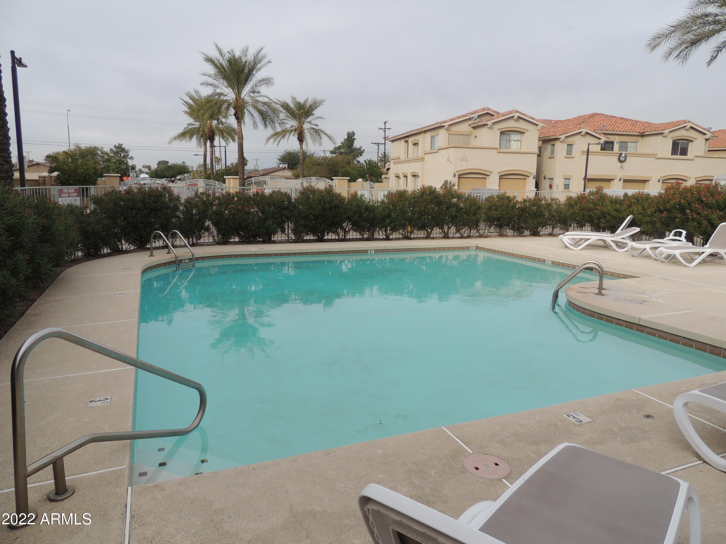 525 North Miller Road, Unit 129 Scottsdale, AZ 85257 - Photo 17 of 19 an aerial view of a house with a lake view