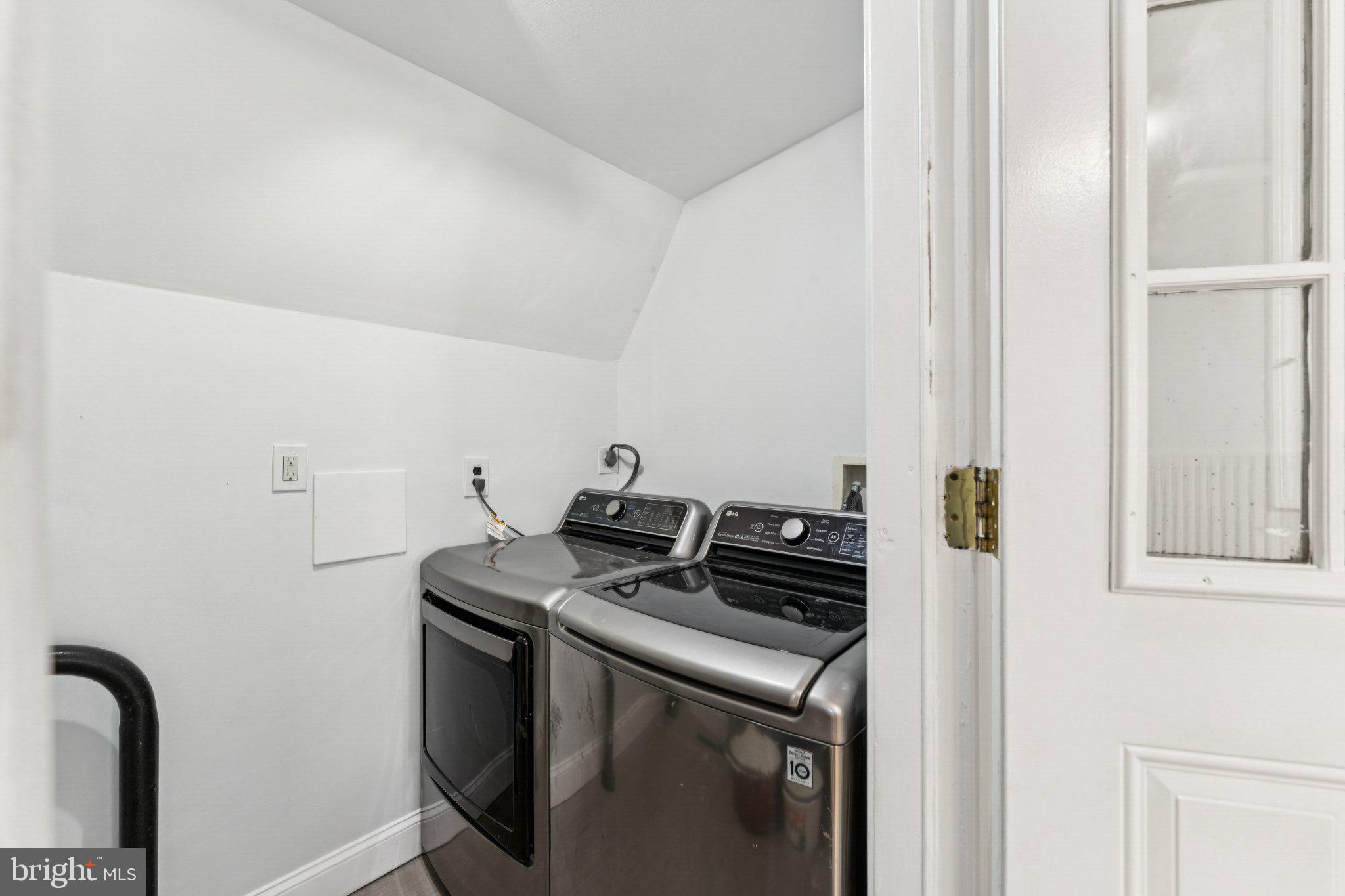 621 Kenyon Street Northwest Washington, DC 20010 - Photo 12 of 25 a utility room with dryer and washer