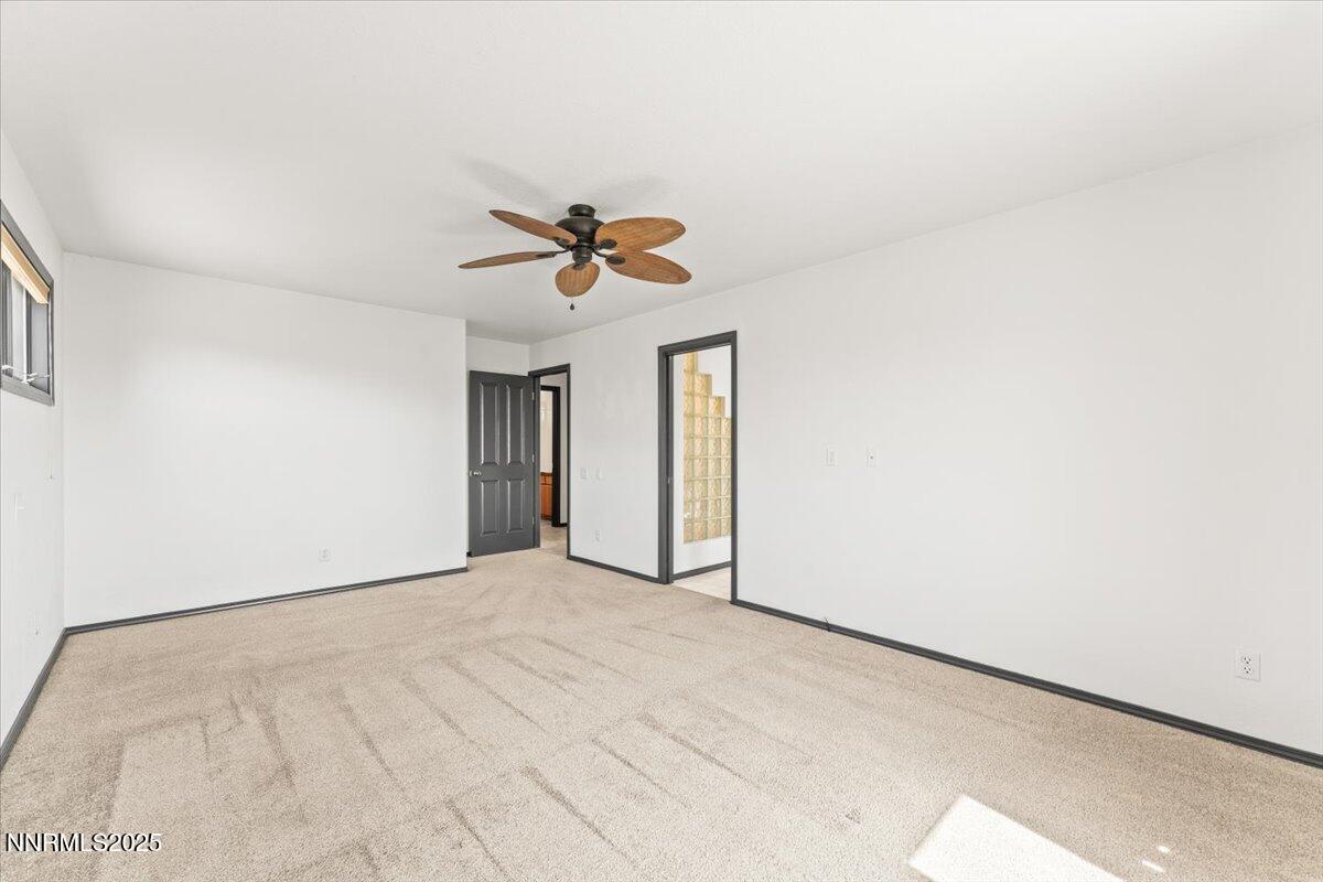 5455 Wild Horse Road Reno, NV 89510 - Photo 18 of 33 a view of an empty room with a window