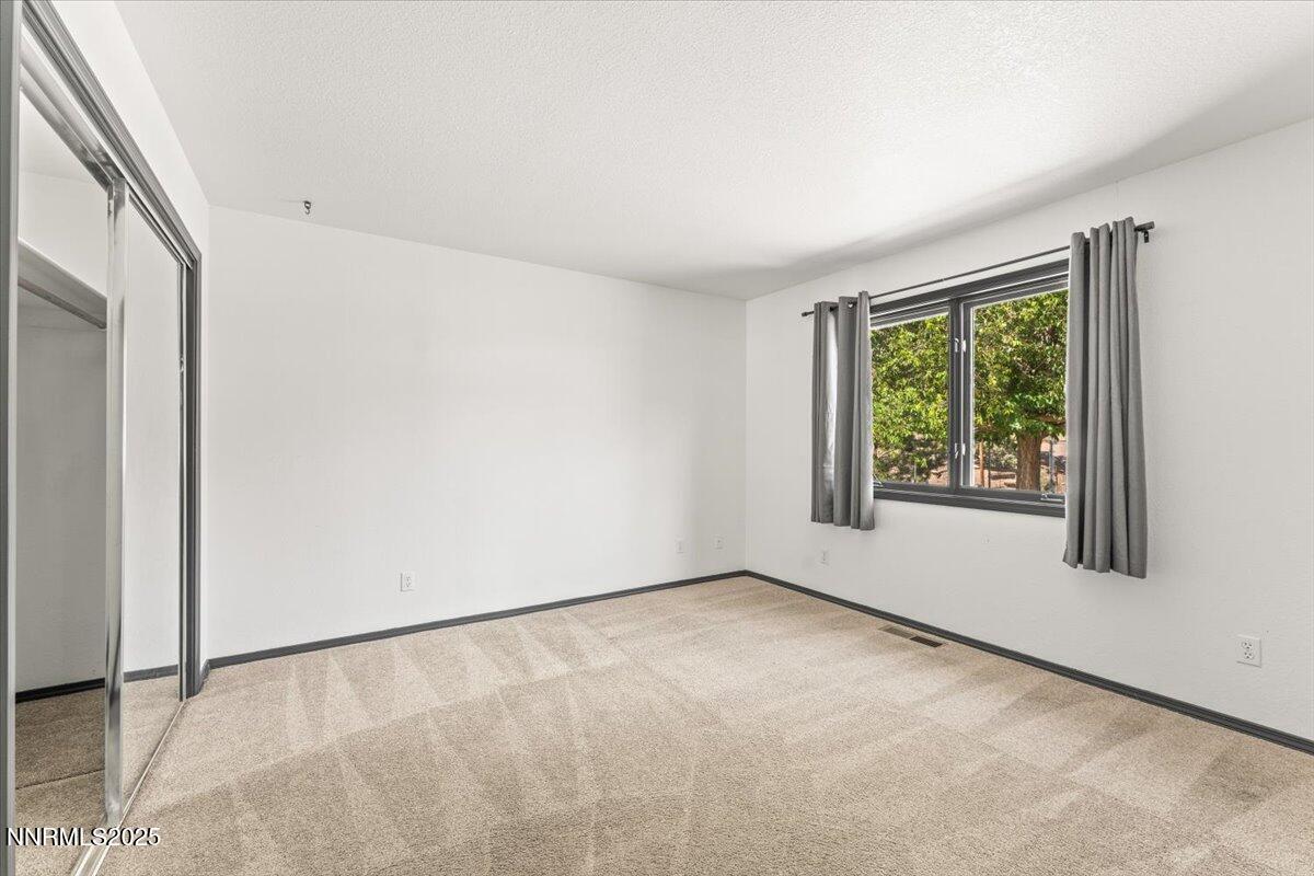 5455 Wild Horse Road Reno, NV 89510 - Photo 22 of 33 an empty room with windows