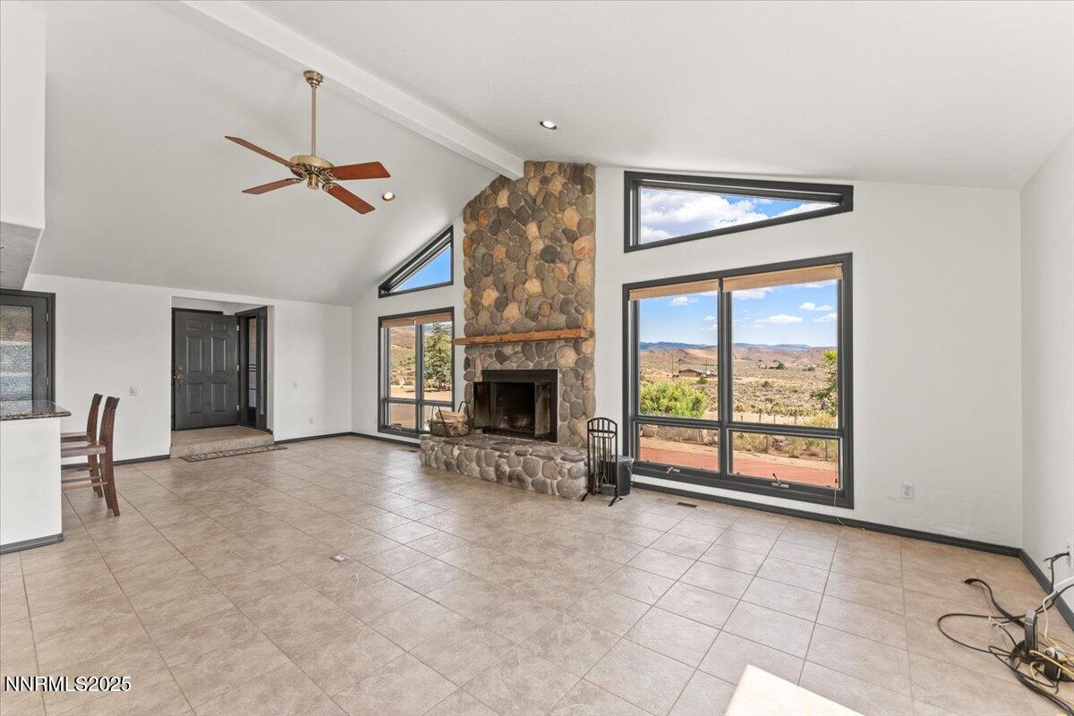 5455 Wild Horse Road Reno, NV 89510 - Photo 9 of 33 an empty room with windows and fireplace