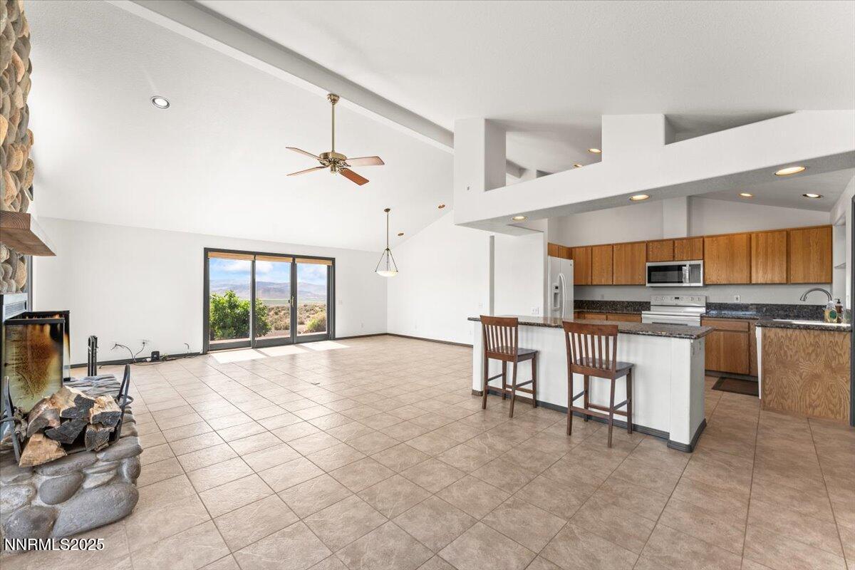 5455 Wild Horse Road Reno, NV 89510 - Photo 10 of 33 a large white kitchen with lots of counter top space and appliances