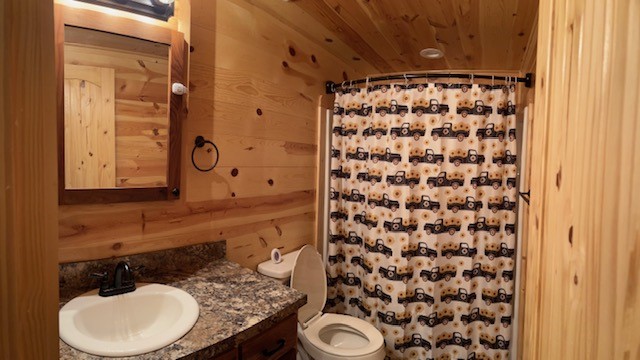 2570 North Old Bruceville Road Bruceville, TX 76630 - Photo 25 of 44 a bathroom with a sink and a mirror