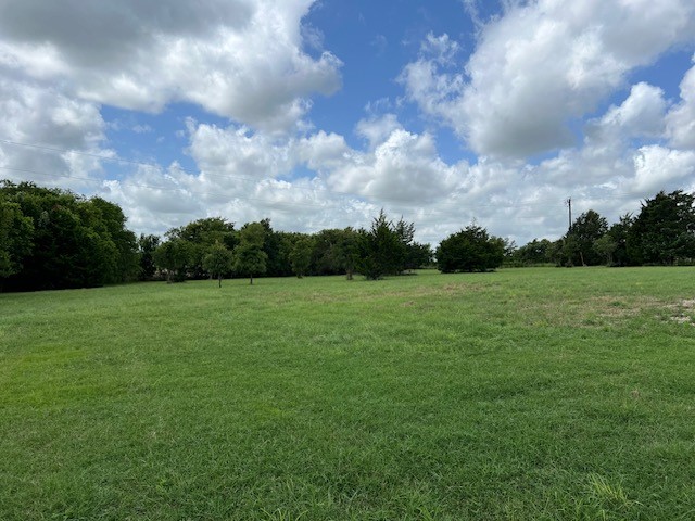 2570 North Old Bruceville Road Bruceville, TX 76630 - Photo 7 of 44 a view of a garden with a pathway