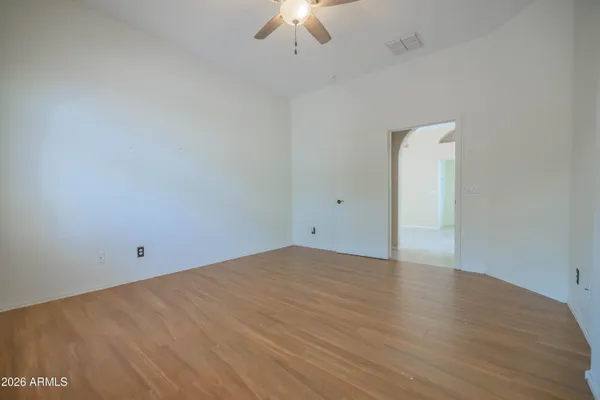 a bathroom with a sink a mirror and a shower