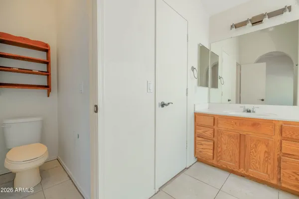 a view of a bathroom with bathtub and shower