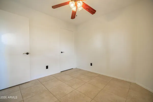 a bathroom with a sink toilet vanity and shower