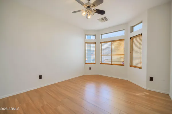 a view of a house with a yard and garage