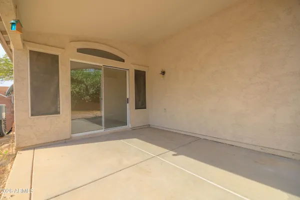 a view of yellow and white house