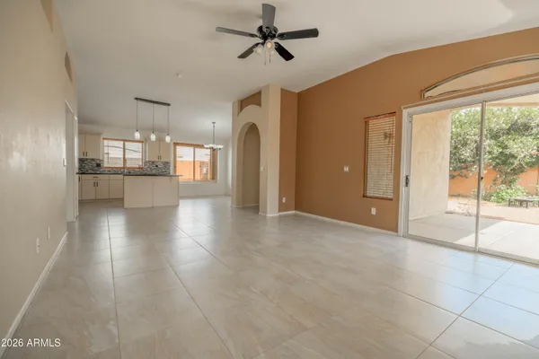 a view of a kitchen with a sink and a stove top oven