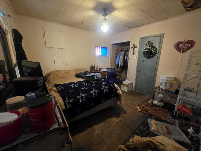 a bathroom with a sink mirror vanity and toilet