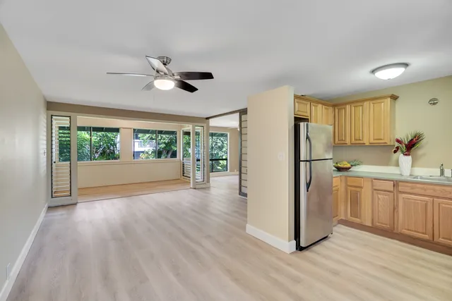 a view of kitchen with cabinets and stainless steel appliances