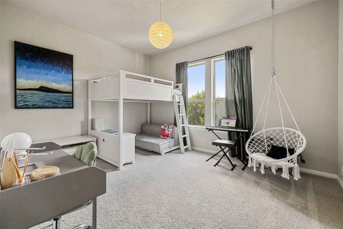 2220 Normandy View Leander, TX 78641 - Photo 32 of 40 Bedroom featuring carpet flooring and a desk