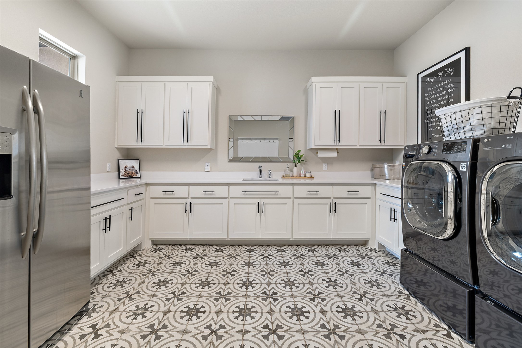 2220 Normandy View Leander, TX 78641 - Photo 38 of 40 a kitchen with a refrigerator sink and cabinets