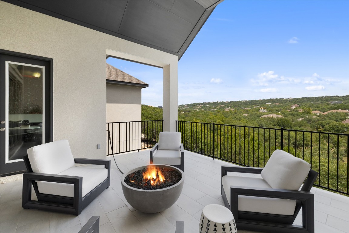 2220 Normandy View Leander, TX 78641 - Photo 39 of 40 View of patio / terrace with an outdoor living space with a fire pit
