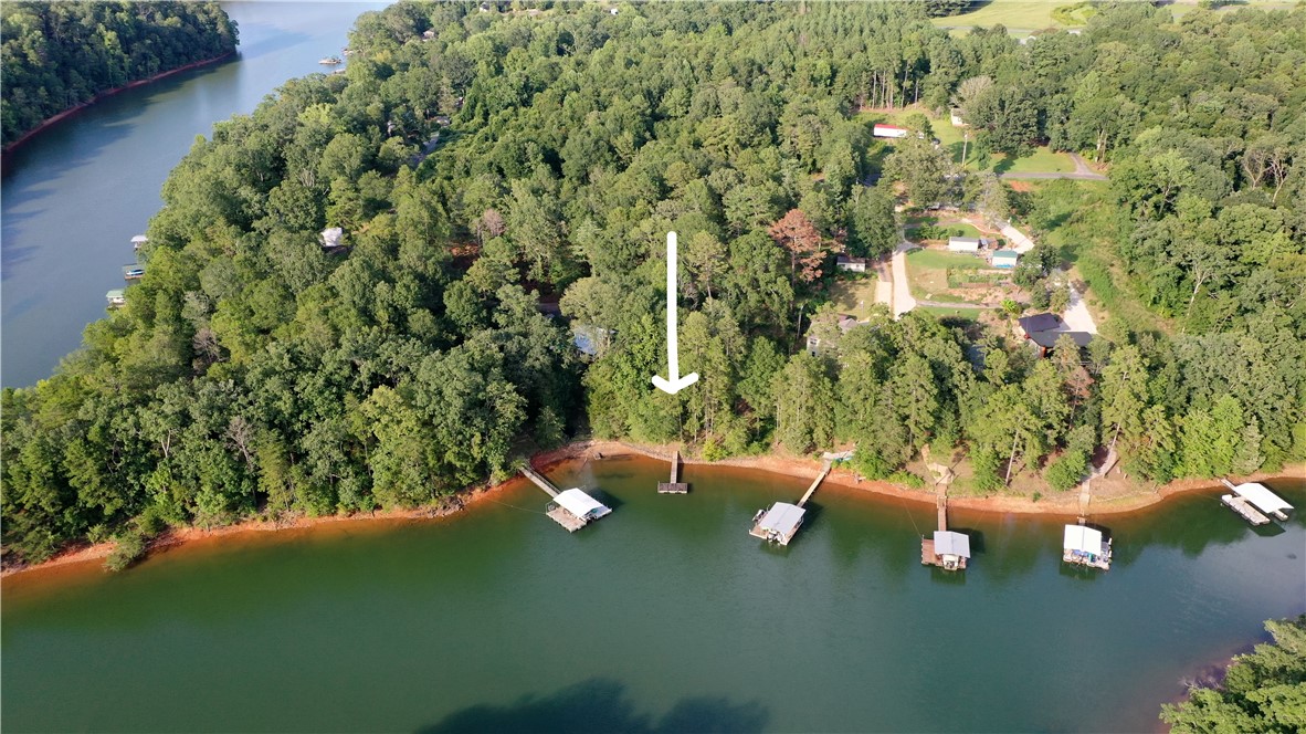 360 Cann Road Anderson, SC 29625 - Photo 1 of 4 A tranquil lakefront property awaits, offering direct water access and wooded surroundings.