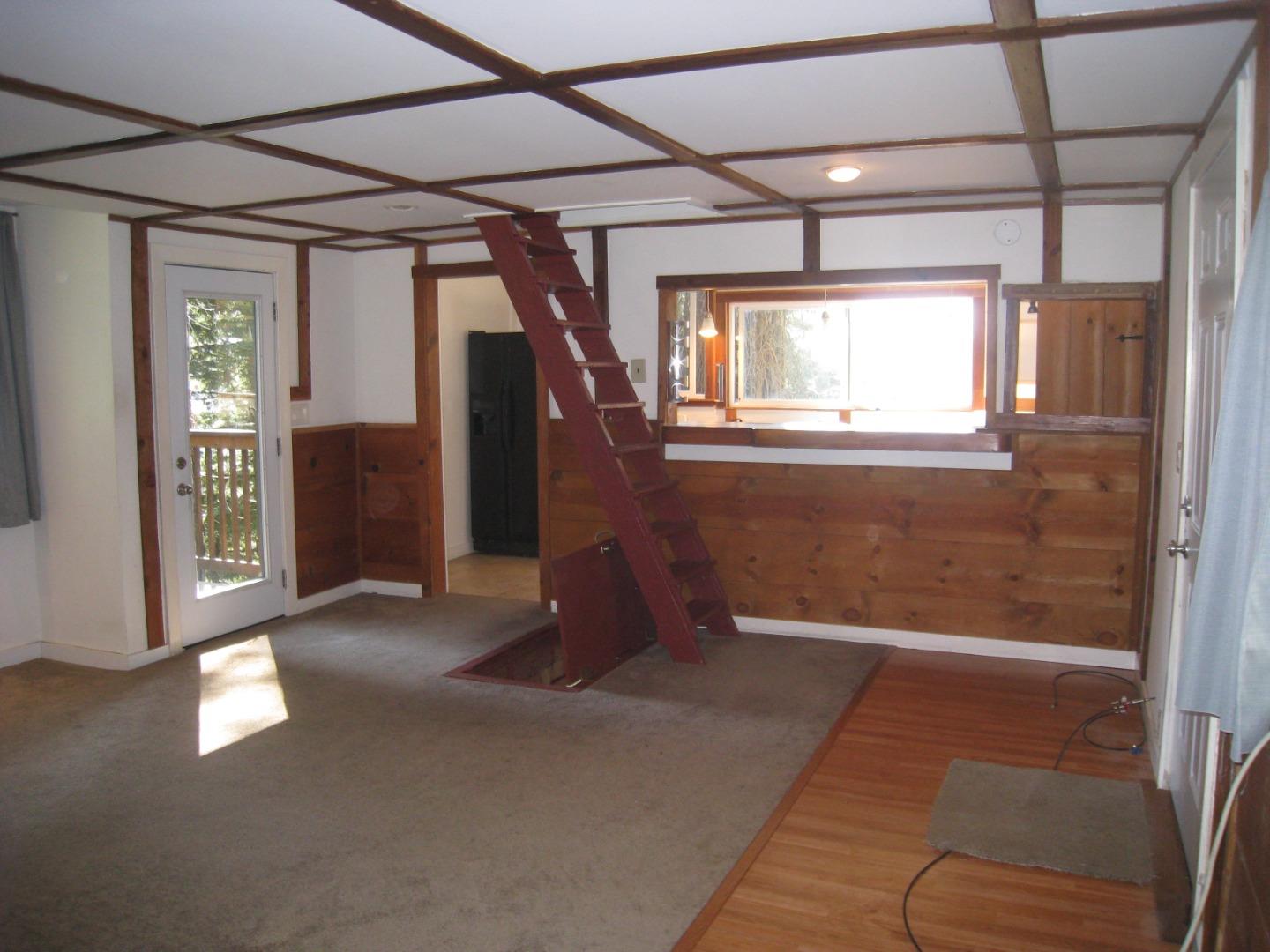 347 Ridge Road Woodside, CA 94062 - Photo 8 of 20 a view of an empty room with a window