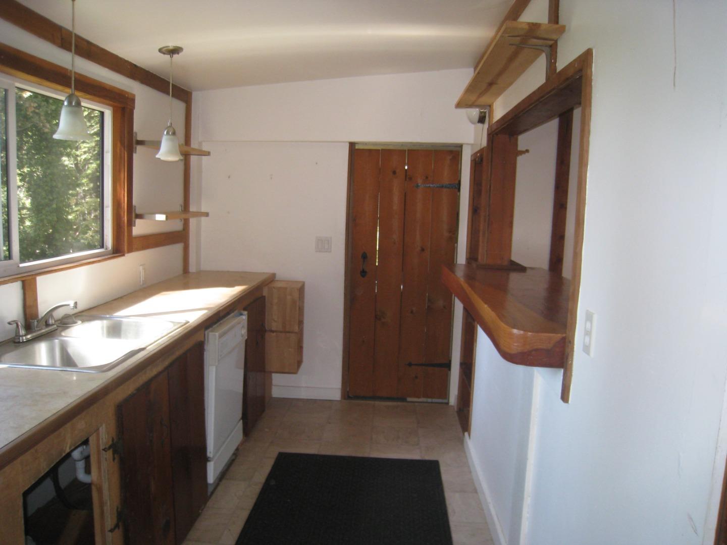 347 Ridge Road Woodside, CA 94062 - Photo 10 of 20 a bathroom with a sink a mirror and a shower
