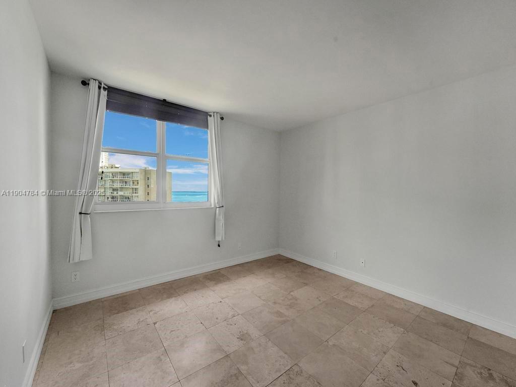 2475 Brickell Avenue, Unit 2006 Miami, FL 33129 - Photo 27 of 61 a view of an empty room with a window