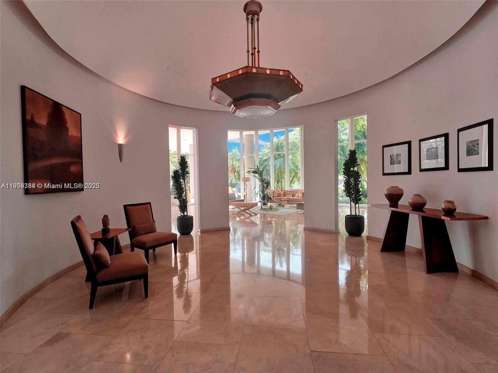 2475 Brickell Avenue, Unit 2006 Miami, FL 33129 - Photo 38 of 61 a view of a dining room with furniture window and outside view