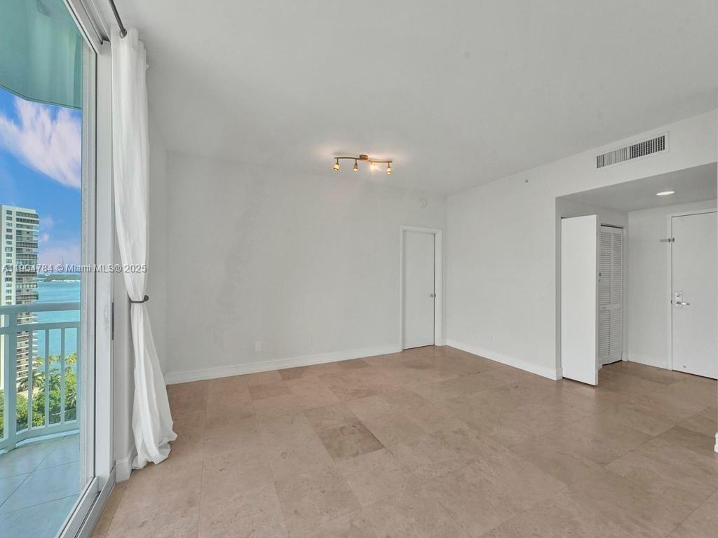 2475 Brickell Avenue, Unit 2006 Miami, FL 33129 - Photo 9 of 61 a view of a room with a ceiling fan
