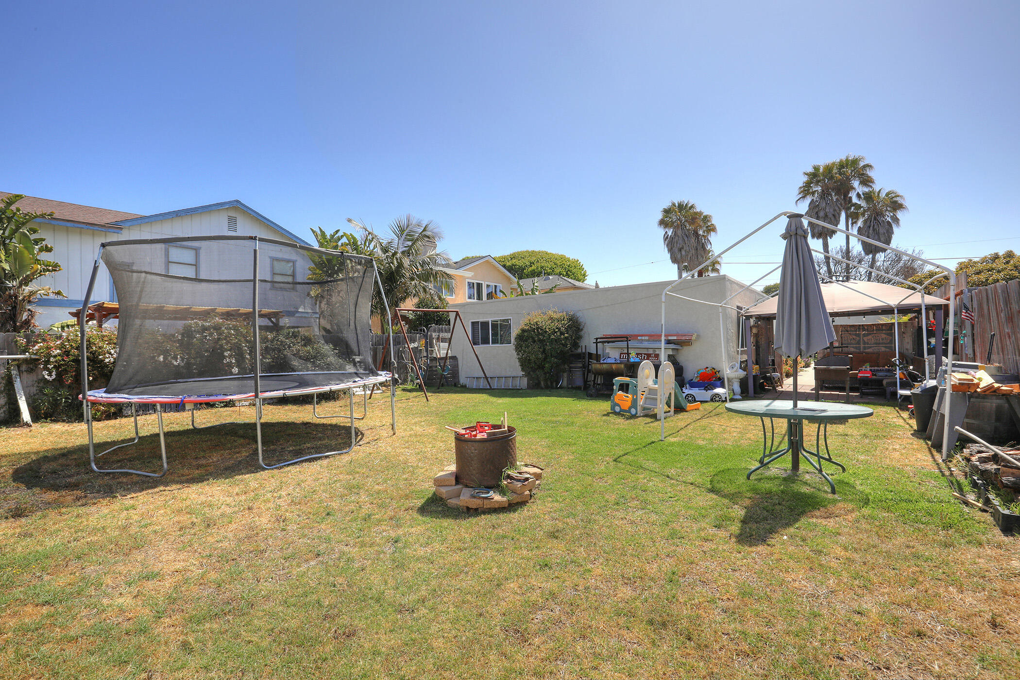 560 South 12th Street Grover Beach, CA 93433 - Photo 29 of 31 a view of a house with swimming pool and sitting area