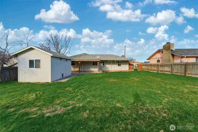 a view of a backyard with a garden