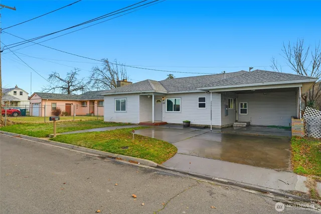 front view of a house with a patio